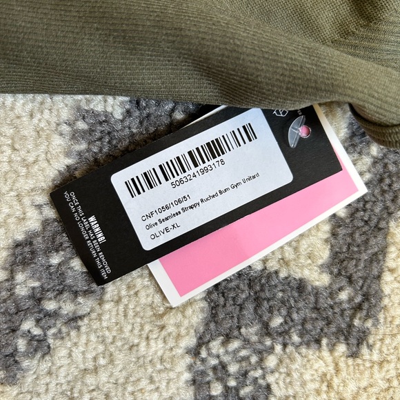 FREE w/ PURCHASE NWT PrettyLittleThing Olive Seamless Strappy Gym Unitard - Picture 8 of 8